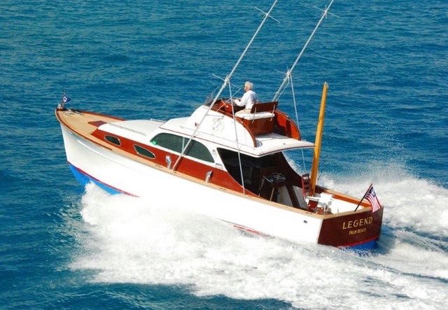 37’ rybovich power boat cruising on open water